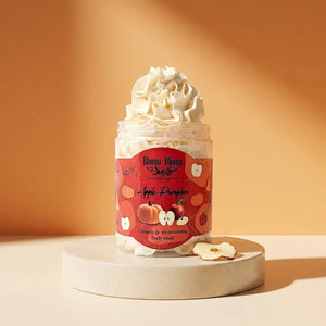 Bloom-Bloom Luxury Bath & Body treats Apple-Pumpkin creamy & moisturizing body wash in a clear jar topped with whipped cream.