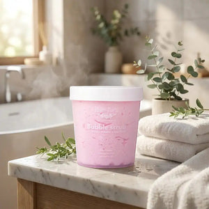 Bloom-Bloom Luxury Bath & Body treats Bubble Scrub Baby Powder, a pink foaming sugar scrub with mango butter, shea butter, and avocado oil.