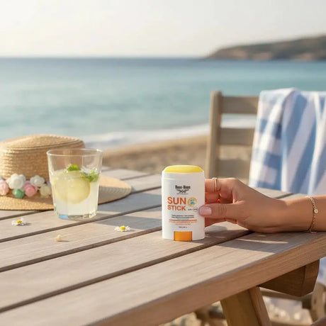 Bloom-Bloom Luxury Bath & Body treats Sun Stick SPF 50, a clear, portable sunscreen stick with Vitamin E and turmeric oil, perfect for face and body.