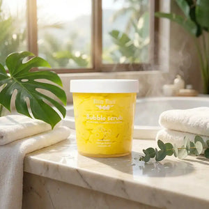 Bloom-Bloom Luxury Bath & Body treats yellow Tropicana bubble scrub with mango butter, shea butter, and avocado oil.