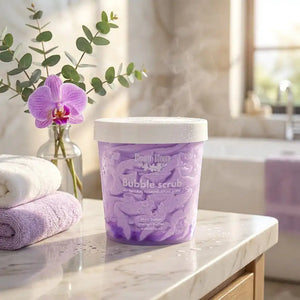 Bloom-Bloom Luxury Bath & Body treats Wild Orchid Bubble Scrub, a 2-in-1 foaming sugar scrub with mango butter and avocado oil.