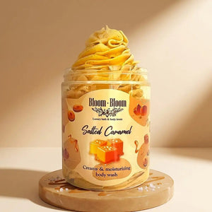Bloom-Bloom Luxury Bath & Body treats Salted Caramel creamy & moisturizing body wash in a clear jar with whipped texture on top.