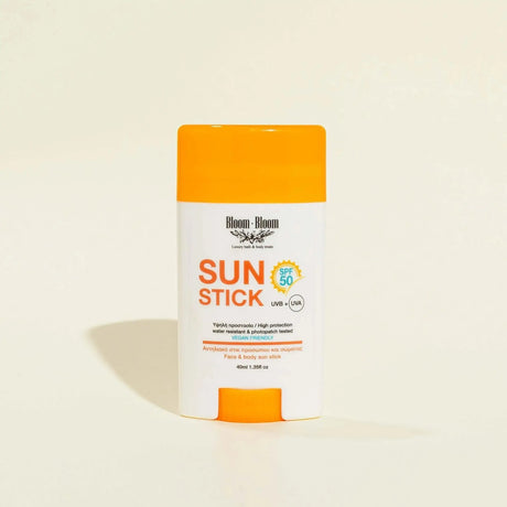Bloom-Bloom Sun Stick SPF 50, a clear, water-resistant face and body sunscreen stick with Vitamin E and turmeric oil.